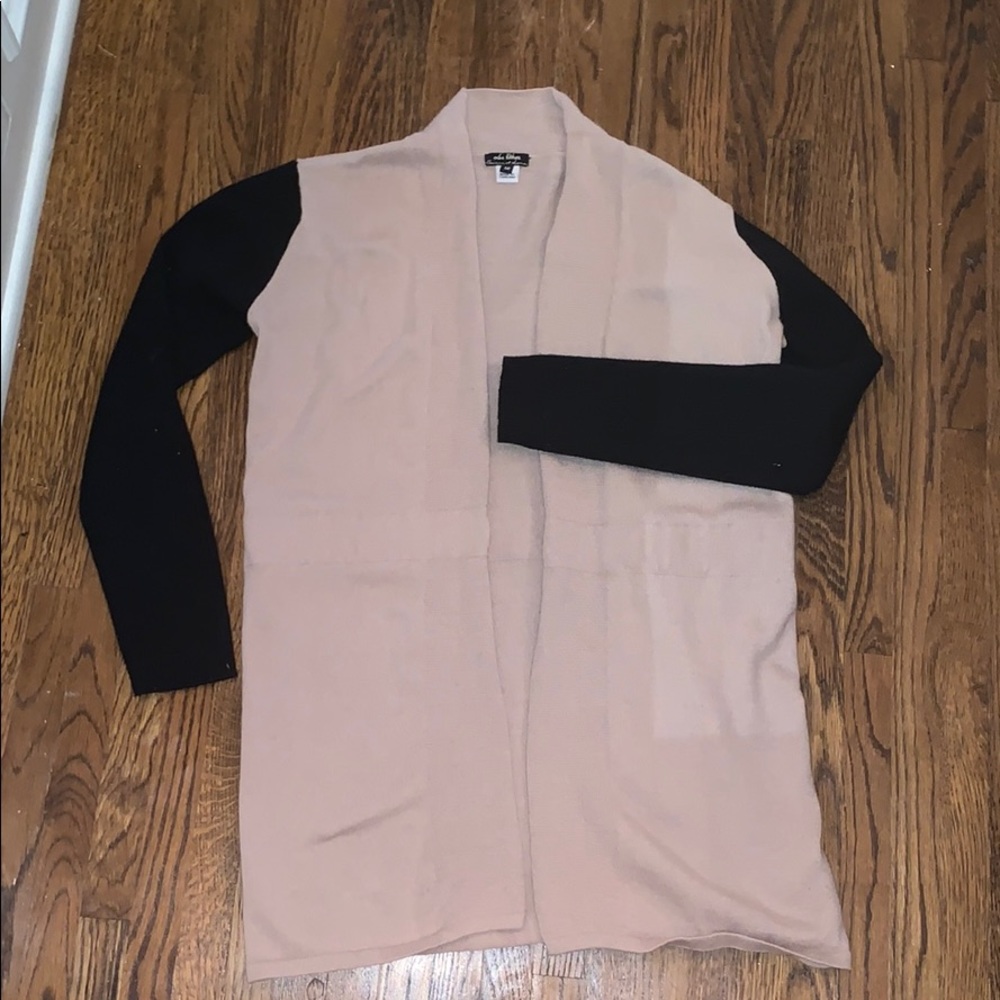 Tan sweater with black sleeves
